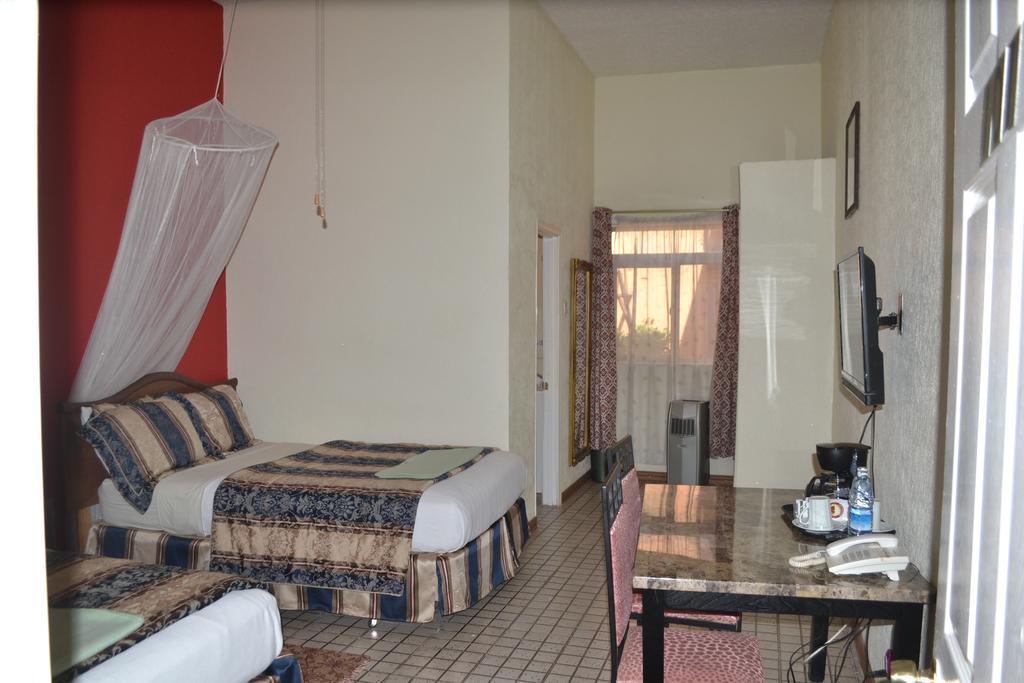 Executive Airport Hotel Entebbe Quarto foto